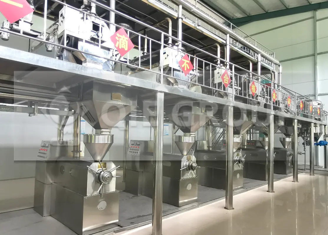 Equipo de prensado de semillas de cacahuete en funcionamiento en un taller de aceite comestible.