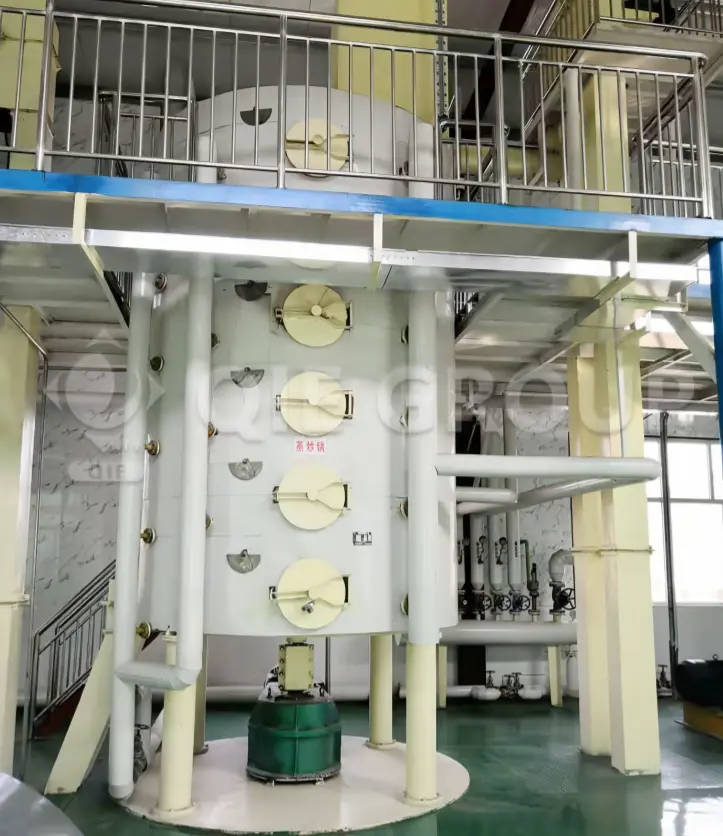 Cocedor al vapor de la capa germinal del maíz utilizado para el tratamiento térmico del germen con el fin de mejorar la extracción de aceite y el sabor.